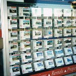 Shopfront display frame made from sheet metal